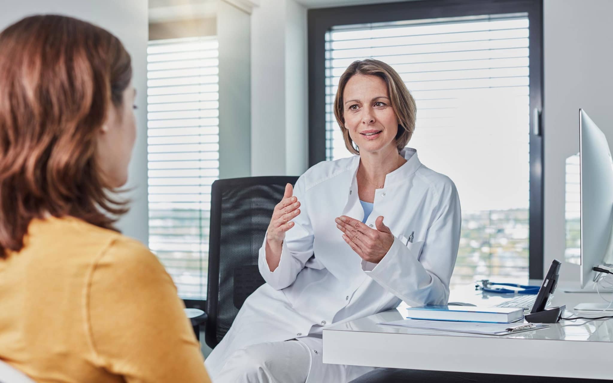 Integrierte Versorgung: Ärztin im Gespräch mit einer Patientin.