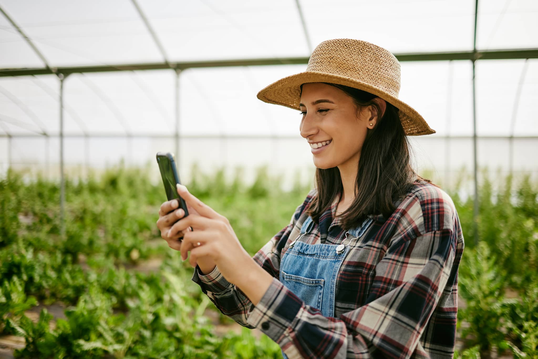DAK App: Woman using face recognition in her smartphone.