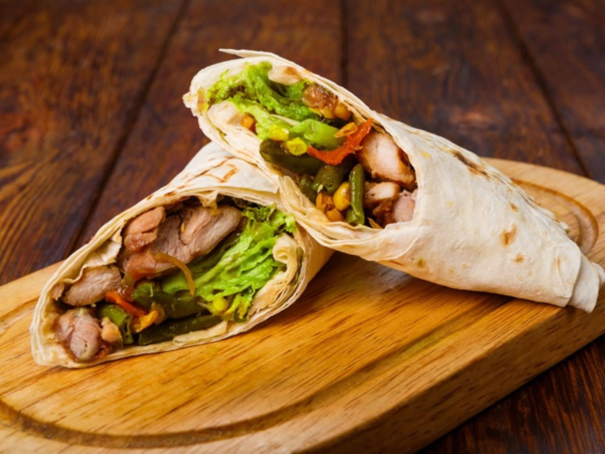 Burritos: Aufgeschnittener Burritos mit Hähnchen Süßkartoffelfüllung