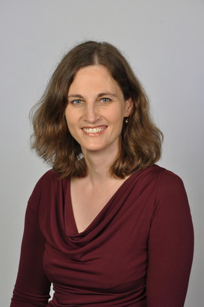 Bild: Portrait von Frau Dr. Michaela Muthig eine Frau mit Schulterlangen braunem Haar.